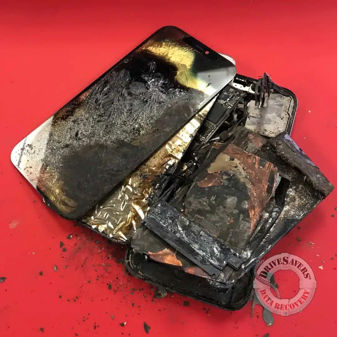pieces of an iPhone 12 Pro that was dropped in a bonfire