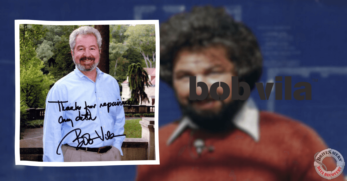 The signed photograph captures a smiling man with gray hair and a beard, wearing a light blue shirt. The inscription on the photo expresses gratitude for deck repairs. In the blurred background, another individual with a similar hairstyle can be seen, adding an element of curiosity to the image.