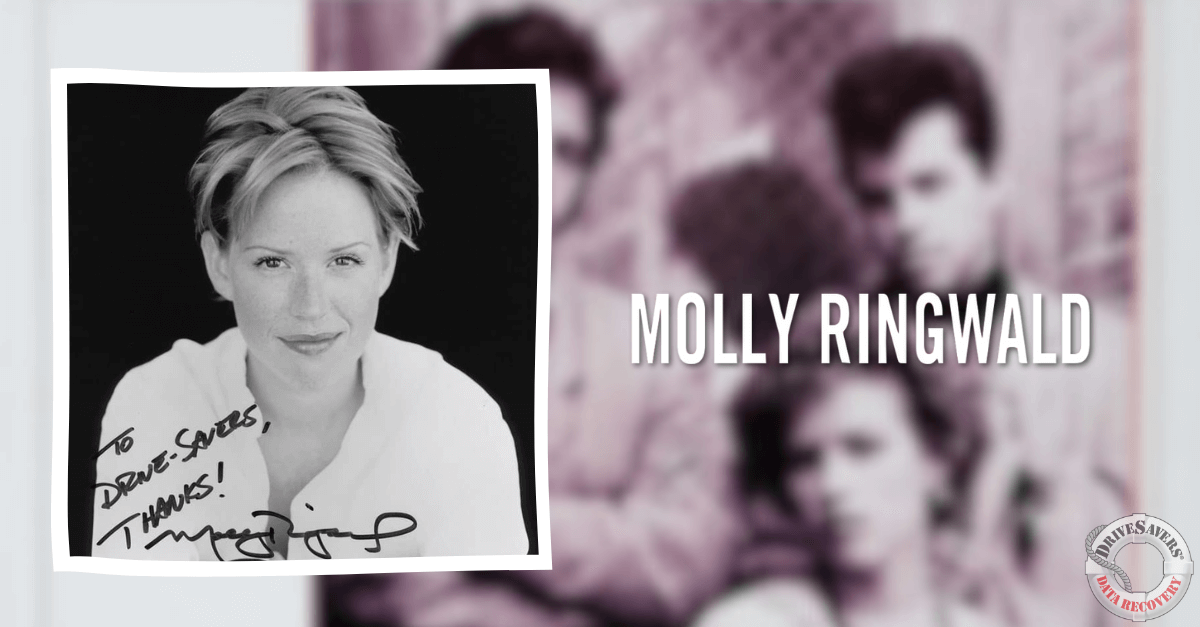 You have a signed black and white photograph featuring Molly Ringwald. In the photo, she is smiling and has short hair, wearing a white shirt. The dedication is made out to Drew and Charles, expressing gratitude. Behind her, there is a faded image of three people in the background. This could be a wonderful keepsake for fans of Molly Ringwald or collectors of autographed memorabilia.